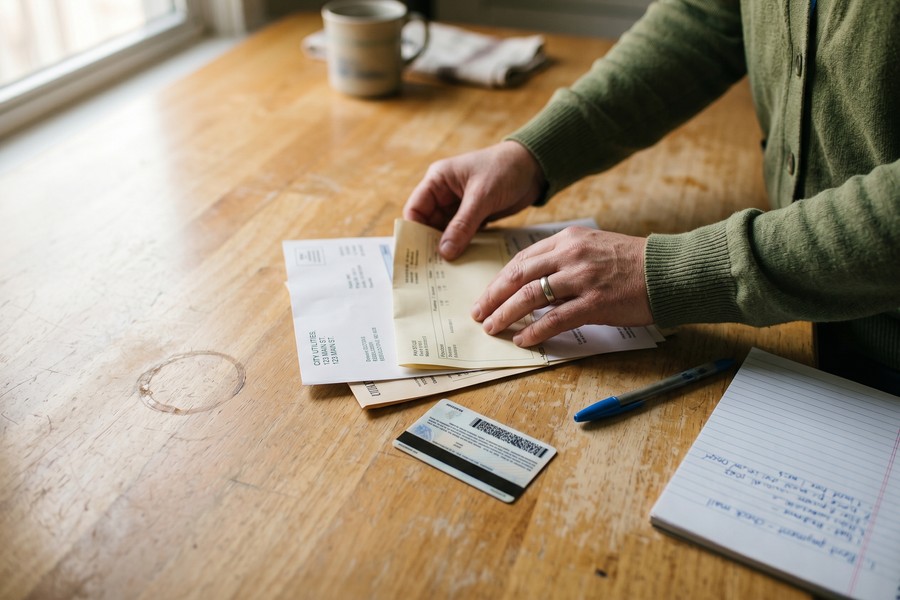 A borrower meeting with a CDFI loan officer at a community lending office